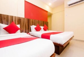 Deluxe Triple Room | Egyptian cotton sheets, premium bedding, individually furnished, desk - Symphony Hotel (Mumbai)
