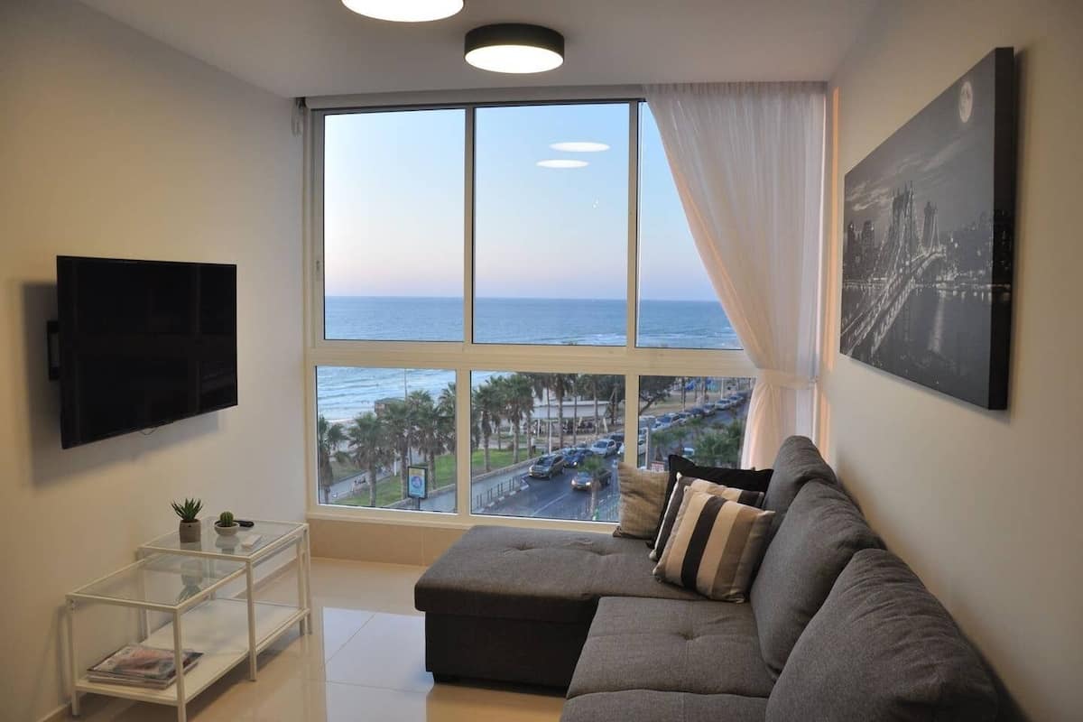 Design Apartment | Living area | Flat-screen TV