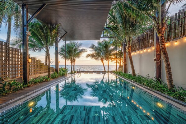 Outdoor pool, open 7:00 AM to 7:00 PM, pool umbrellas, pool loungers