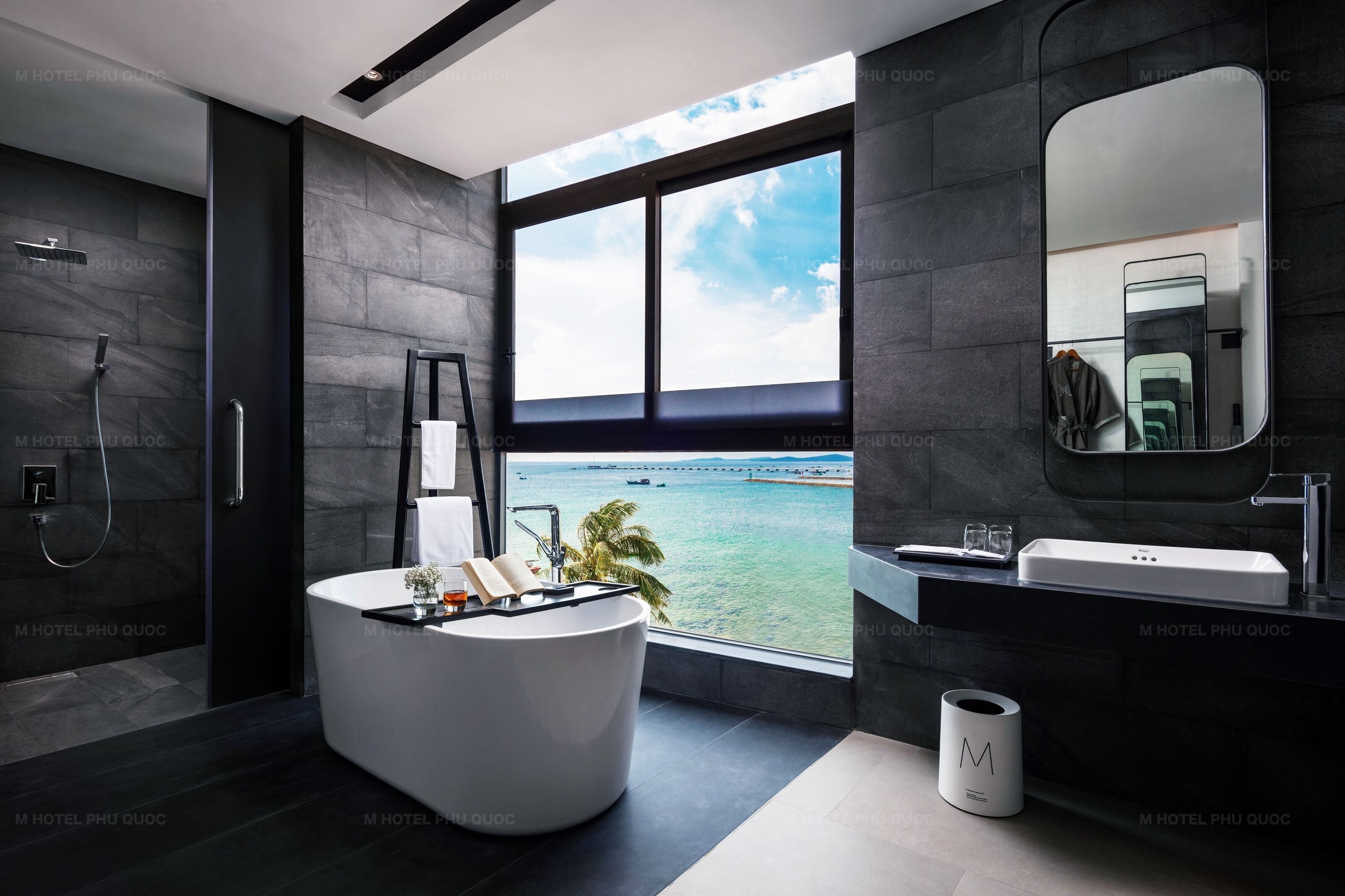 deluxe double suite | bathroom | designer toiletries, hair dryer, bathrobes, slippers