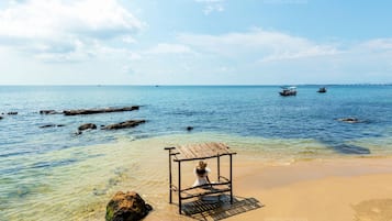On the beach, white sand