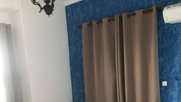 Blackout drapes, WiFi (free), bed sheets