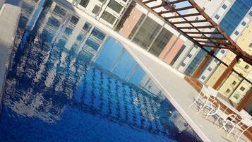 Indoor pool, outdoor pool, pool umbrellas, sun loungers