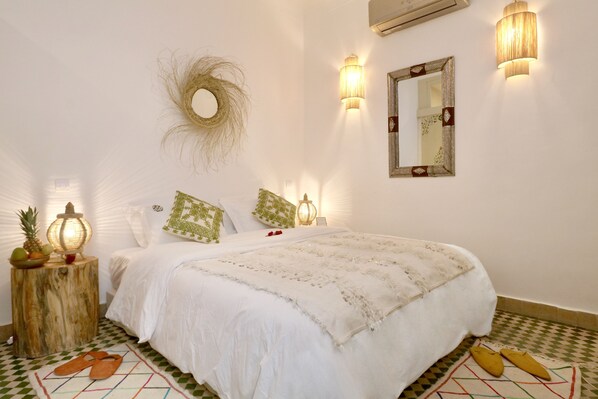 Premium bedding, down duvets, individually decorated