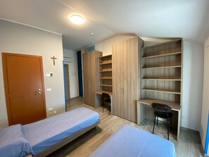 Desk, laptop workspace, blackout curtains, free WiFi