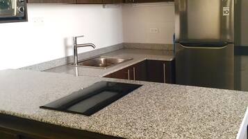 Microwave, coffee/tea maker, cookware/dishes/utensils