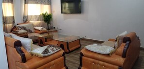 Suite presidencial | Área de sala de estar | Televisión 