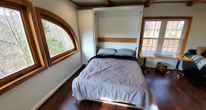 Charming cabin nestled deep in the woods, great for a peaceful getaway