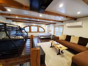 Living area - Charming cabin nestled deep in the woods, great for a peaceful getaway (Franklin)