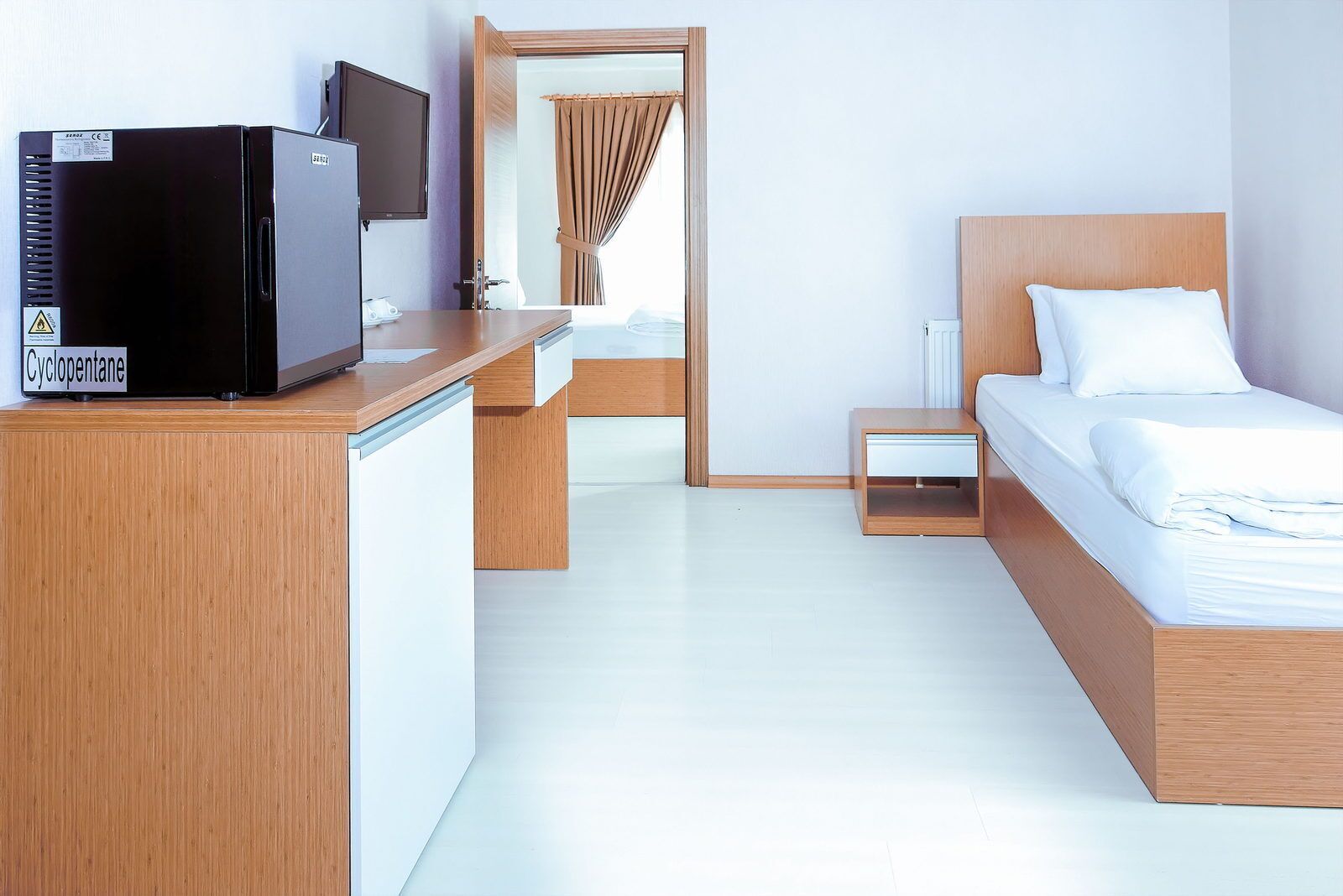 minibar, desk, laptop workspace, blackout curtains