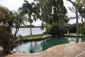 Outdoor pool - Lakefront Artist's Loft - Relax in Luxury! (Orlando)