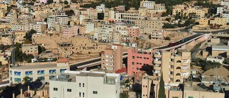 A densely packed urban area with various buildings, including residential and commercial structures.
