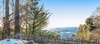 Charming oceanfront home, private hot tub, & water views