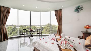 Deluxe Double Room | Minibar, desk, blackout curtains, iron/ironing board