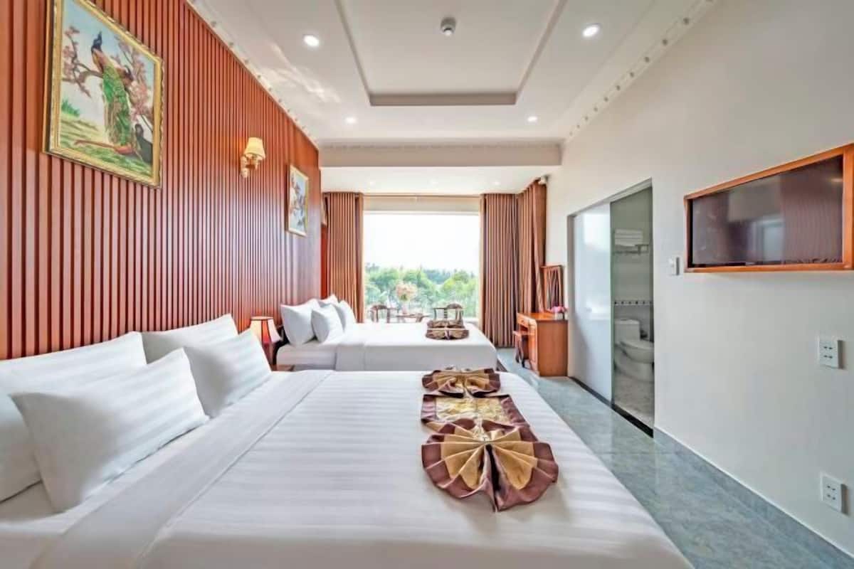 Minibar, desk, blackout curtains, iron/ironing board