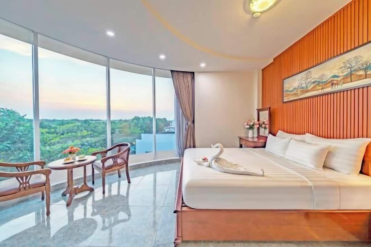 Minibar, desk, blackout curtains, iron/ironing board