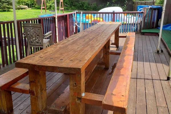 Covered 15' picnic table for enjoying meals al fresco.