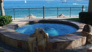 A hot tub with a view of the sea and boats. - Expansive ocean views, luxurious villa-home away from home! (Cabo San Lucas)
