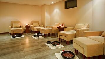 Relax in comfort with plush sofas and chairs, a flat-screen TV, and serene ambiance.