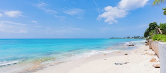 Nautilus One – A Beachfront Condo on Seven Mile Beach - by Cayman Villas