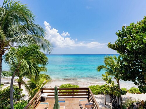 Nautilus One – A Beachfront Condo on Seven Mile Beach - by Cayman Villas