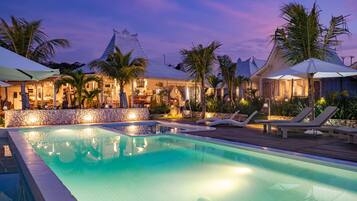 Outdoor pool, open 7:00 AM to 8:00 PM, pool umbrellas, pool loungers