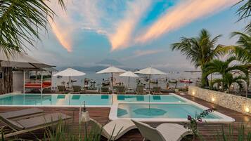Outdoor pool, open 7:00 AM to 8:00 PM, pool umbrellas, sun loungers