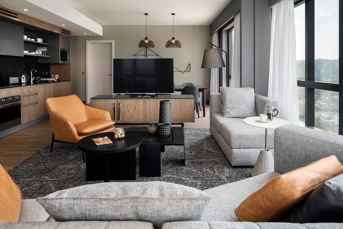 Presidential Suite, 3 Bedrooms, Non Smoking | Living area | 55-inch flat-screen TV with cable channels, TV