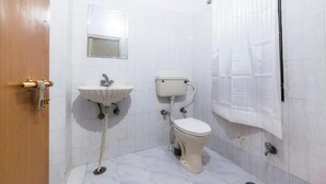 Douche, douche à « effet pluie », serviettes fournies
