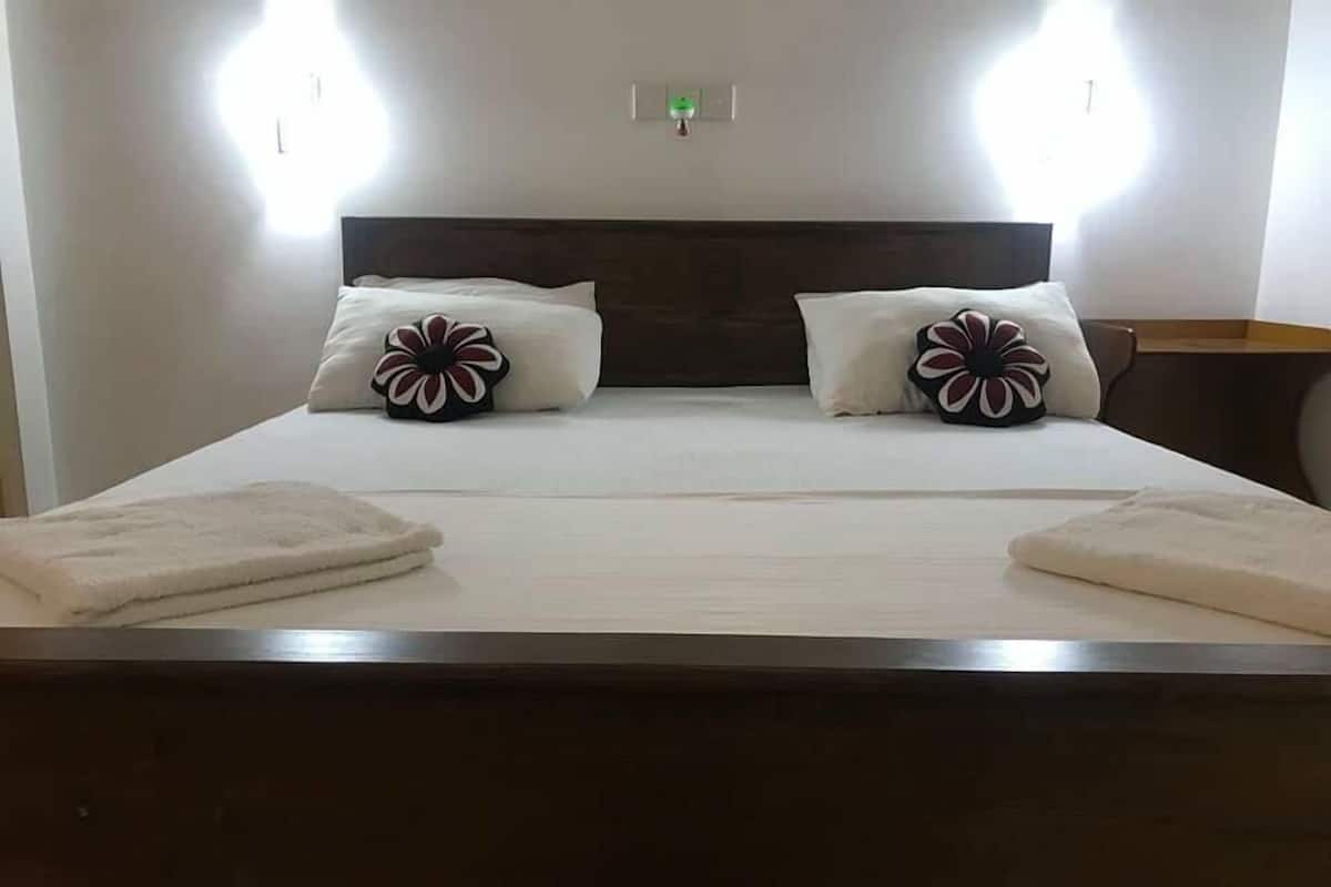 Minibar, desk, laptop workspace, blackout curtains