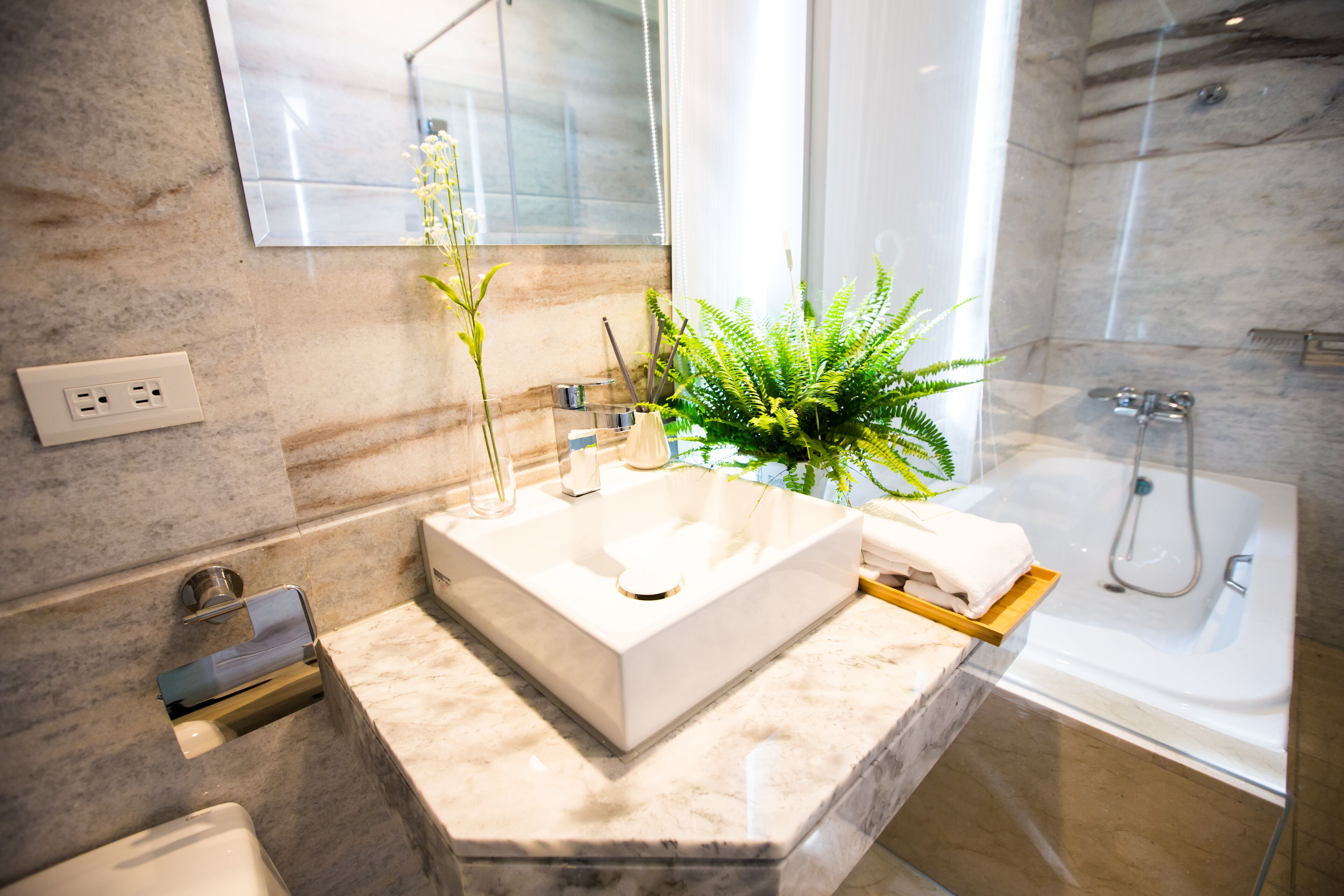 deluxe double room | bathroom | shower, free toiletries, hair dryer, slippers