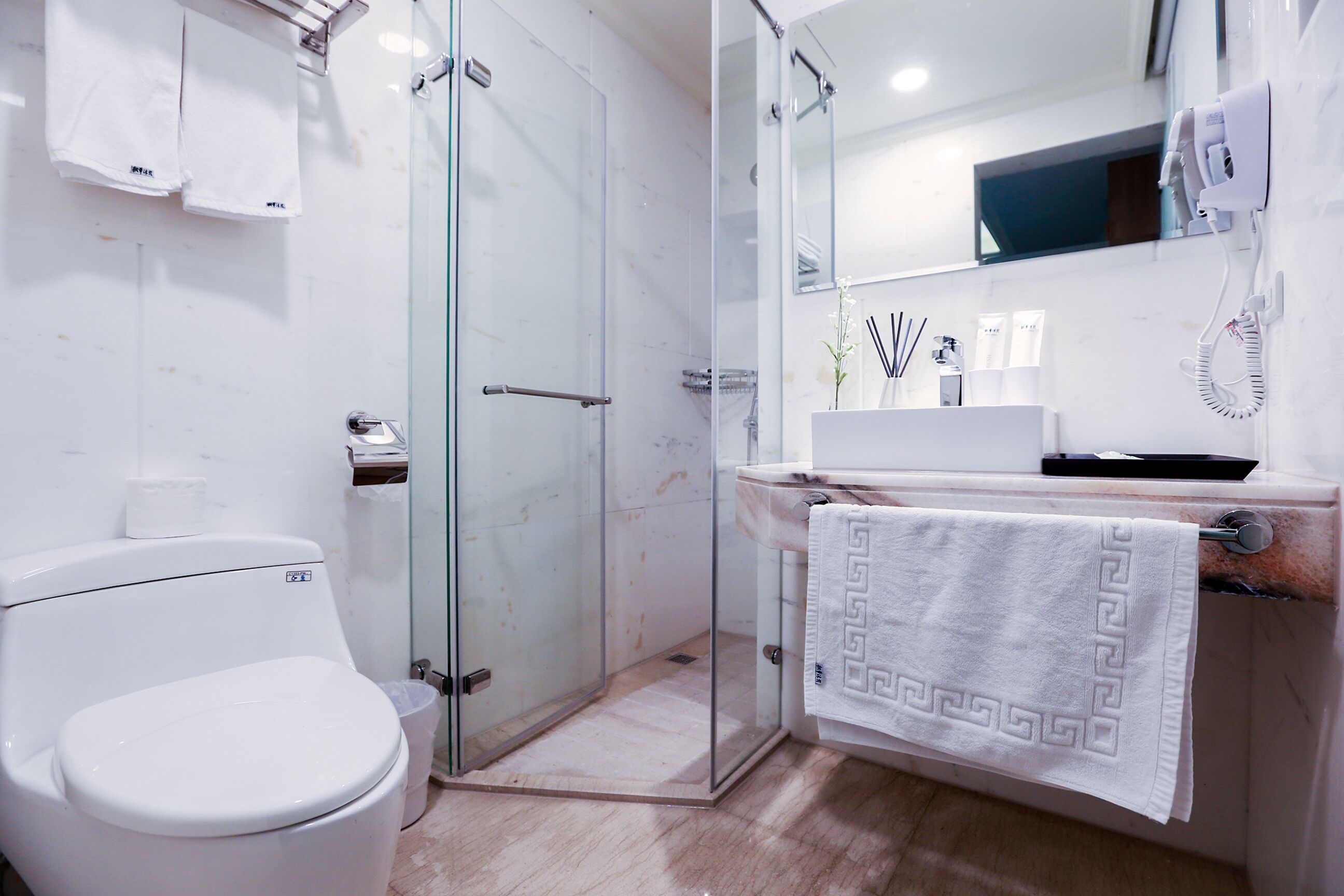 economy double room | bathroom | shower, free toiletries, hair dryer, slippers