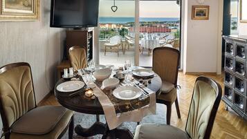 Luxury Apartment | Living room | 40-inch LCD TV with cable channels, TV, fireplace