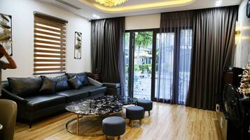 5BR Duplex villa by the beach | Living area | Smart TV