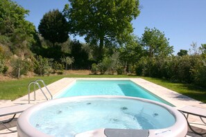 Seasonal outdoor pool, pool umbrellas, pool loungers