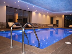 Indoor pool, open 10:00 AM to 8:30 PM, pool loungers