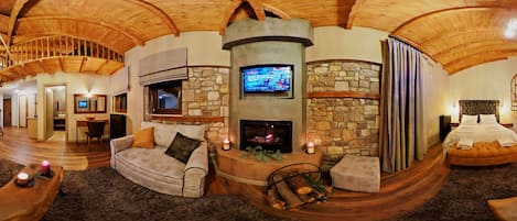 Phòng Suite Cao cấp | Phòng khách | TV LCD 40-inch có truyền hình vệ tinh, TV, lò sưởi