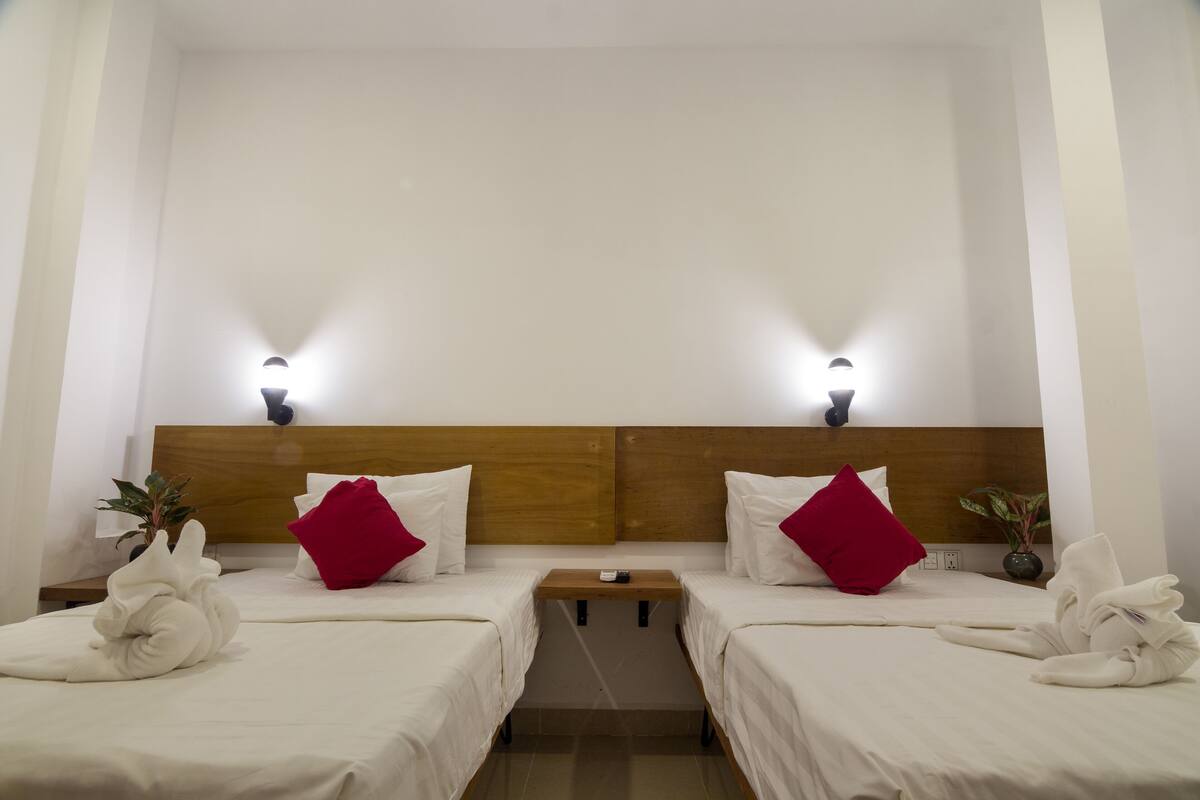 Chambre Deluxe avec lits jumeaux | Accès au Wi-Fi (inclus), literie fournie
