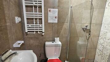 Standard Apartment | Bathroom | Shower, hair dryer, towels, soap