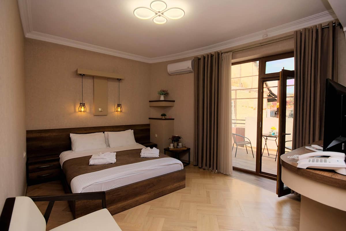 King Room, Garden View | 1 quarto, roupas de cama premium, camas com colchões pillow-top