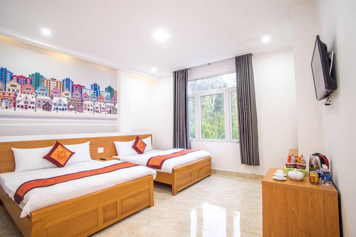 Junior Triple Room, City View | Desk, blackout curtains, soundproofing, iron/ironing board (on request)