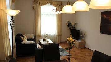 Apartment (Zaitoune, Lahnstraße 52) | Living area | Flat-screen TV