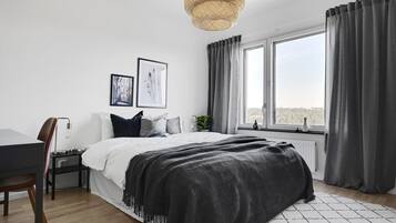 2 bedrooms, blackout curtains, soundproofing, iron/ironing board