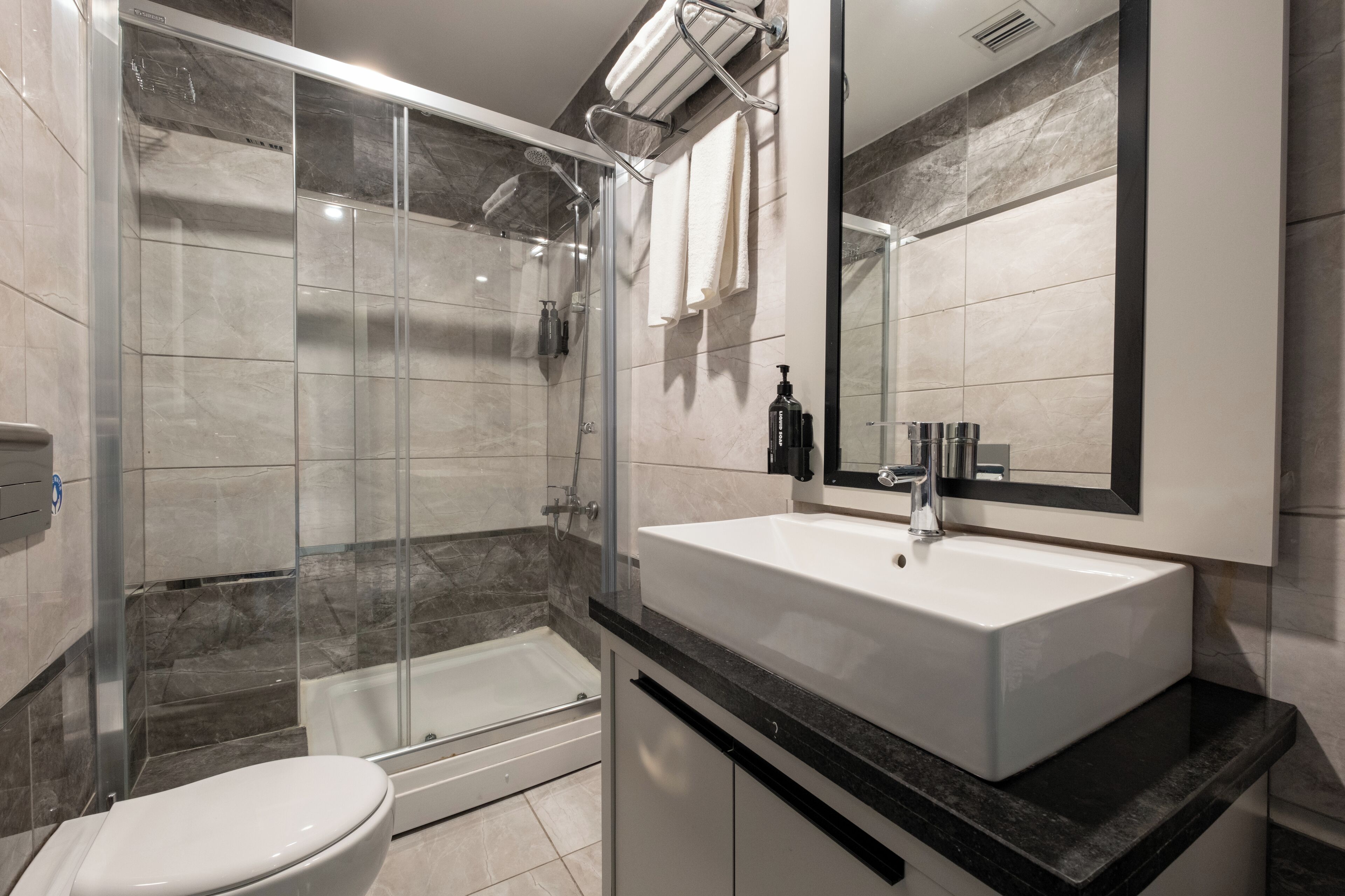 standard double room | bathroom | shower, designer toiletries, hair dryer, slippers