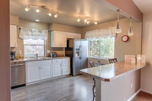 House (3 Bedrooms) | Private kitchen | Full-size fridge, oven, coffee/tea maker, toaster