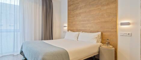 Kamar Double | Selimut bulu angsa, meja kerja, Wi-Fi gratis, dan seprai linen