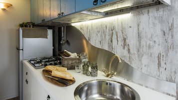 Deluxe Bungalow, Kitchen | Private kitchen