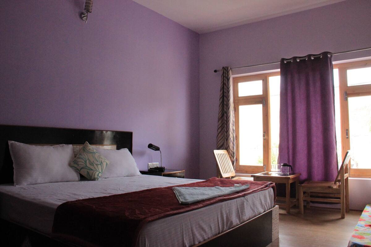 Deluxe kamer, 1 twee- of 2 eenpersoonsbedden | Beddengoed