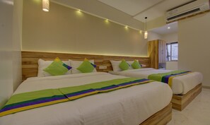 Family Quadruple Room | Free WiFi, bed sheets - Hotel Amisha International (Surat)