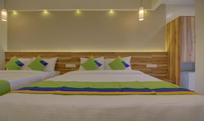 Family Quadruple Room | Free WiFi, bed sheets - Hotel Amisha International (Surat)
